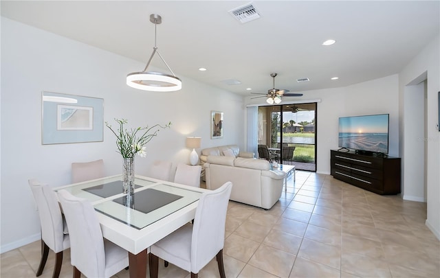 19269 Serafina St, Venice, FL 34293 - dining space featuring a ceiling fan, recessed lighting, and light tile patterned floors