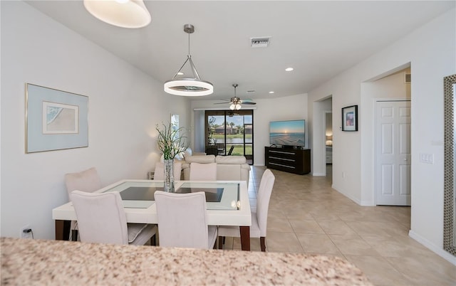 19269 Serafina St, Venice, FL 34293 - dining room featuring a ceiling fan, recessed lighting, and light tile patterned flooring
