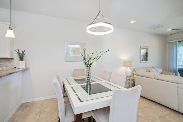 19269 Serafina St, Venice, FL 34293 - dining area featuring light tile patterned flooring and recessed lighting