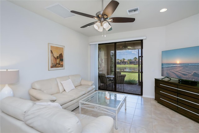 19269 Serafina St, Venice, FL 34293 - living area with ceiling fan, light tile patterned floors, and recessed lighting