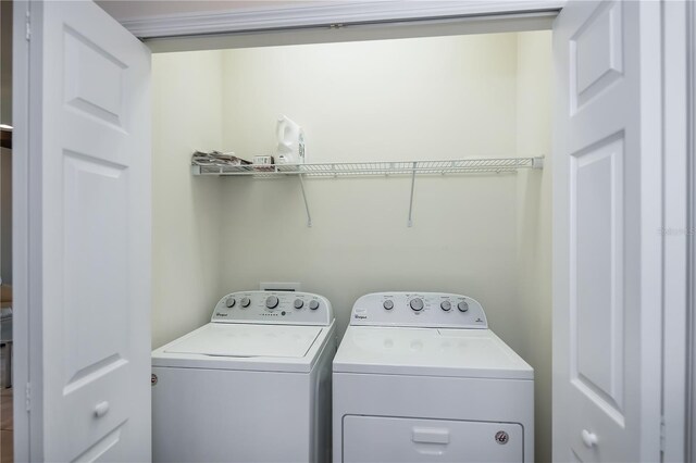 19269 Serafina St, Venice, FL 34293 - washroom featuring separate washer and dryer