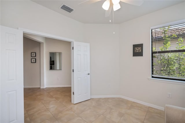 19269 Serafina St, Venice, FL 34293 - spare room featuring ceiling fan and baseboards