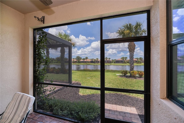 19269 Serafina St, Venice, FL 34293 - sunroom featuring a water view