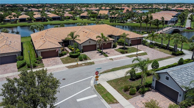 19269 Serafina St, Venice, FL 34293 - aerial perspective of suburban area featuring a nearby body of water