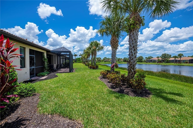 19269 Serafina St, Venice, FL 34293 - view of grassy yard with a water view and a lanai