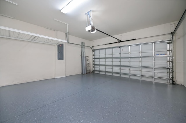 19269 Serafina St, Venice, FL 34293 - garage featuring a garage door opener and electric panel