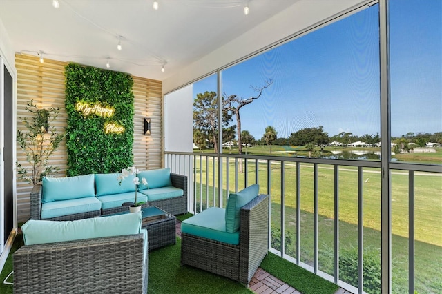 437 Cerromar Ln Unit 424, Venice, FL 34293 - sunroom / solarium with outdoor lounge area, track lighting, a water view, and healthy amount of natural light