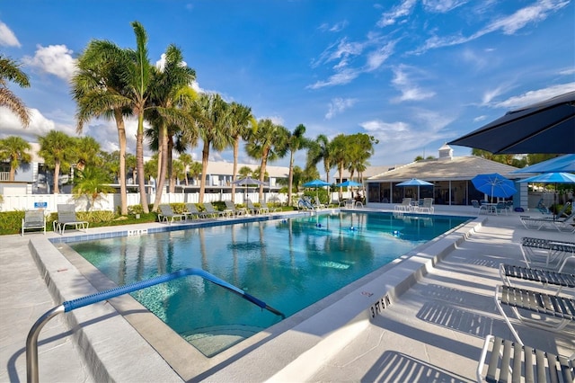 437 Cerromar Ln Unit 424, Venice, FL 34293 - community pool featuring a patio area