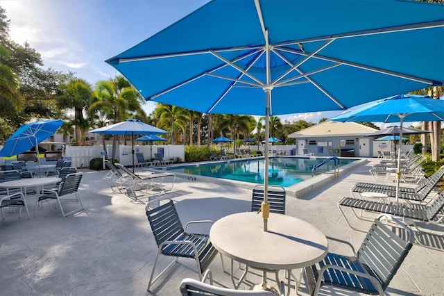 437 Cerromar Ln Unit 424, Venice, FL 34293 - community pool featuring a patio area