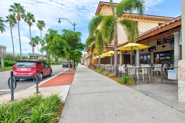 437 Cerromar Ln Unit 424, Venice, FL 34293 - view of asphalt street featuring street lighting and sidewalks