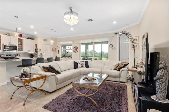 935 Tidewater Shrs Unit 721, Bradenton, FL 34208 - living room featuring light tile patterned floors, ornamental molding, recessed lighting, and a chandelier
