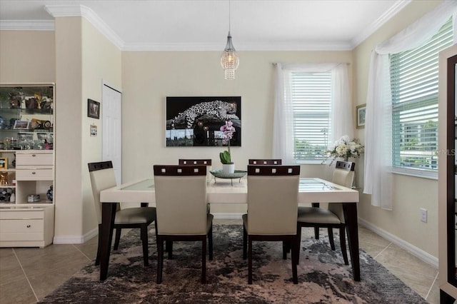 935 Tidewater Shrs Unit 721, Bradenton, FL 34208 - dining room with light tile patterned floors and ornamental molding
