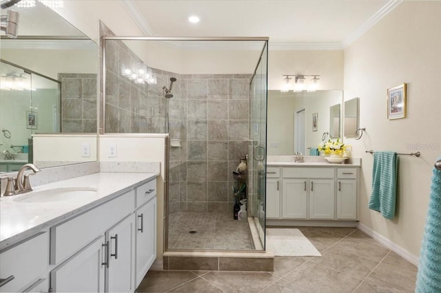 935 Tidewater Shrs Unit 721, Bradenton, FL 34208 - bathroom with a stall shower, two vanities, tile patterned floors, and ornamental molding