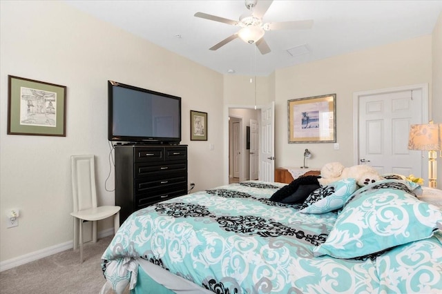 935 Tidewater Shrs Unit 721, Bradenton, FL 34208 - bedroom with light colored carpet and a ceiling fan