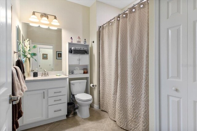 935 Tidewater Shrs Unit 721, Bradenton, FL 34208 - full bathroom featuring tile patterned flooring and vanity