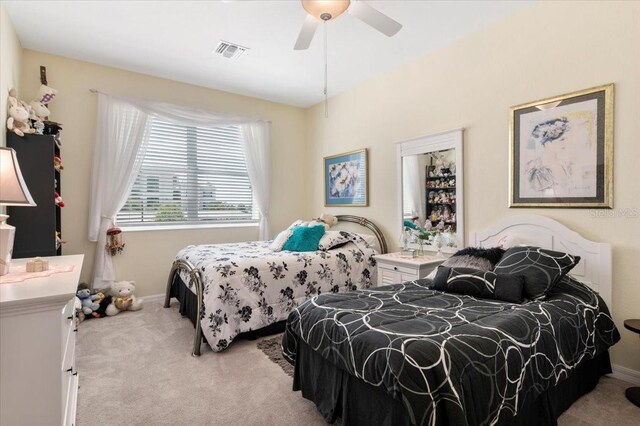 935 Tidewater Shrs Unit 721, Bradenton, FL 34208 - carpeted bedroom featuring baseboards and a ceiling fan