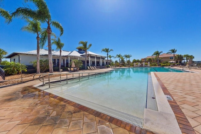 935 Tidewater Shrs Unit 721, Bradenton, FL 34208 - community pool featuring a patio area