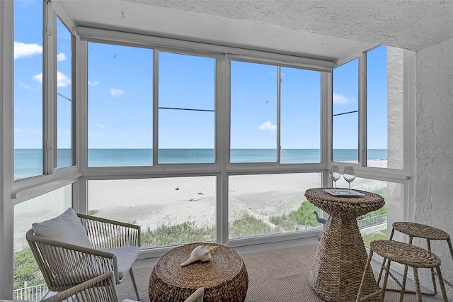 950 Tarpon Center Dr Unit 305, Venice, FL 34285 - sunroom / solarium with a water view and a textured wall
