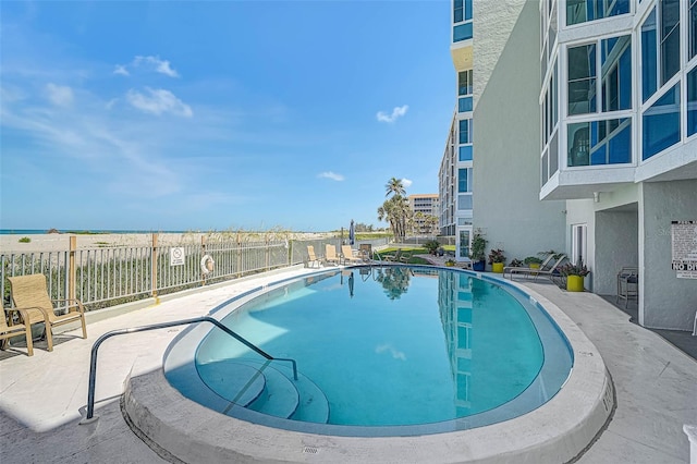 950 Tarpon Center Dr Unit 305, Venice, FL 34285 - community pool featuring a patio