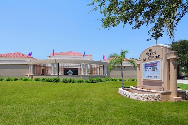 950 Tarpon Center Dr Unit 305, Venice, FL 34285 - view of property's community featuring a lawn