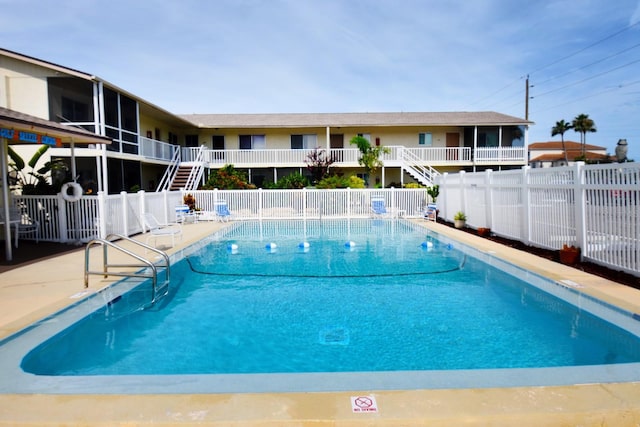 320 Base Ave E Unit 215, Venice, FL 34285 - community pool featuring stairs