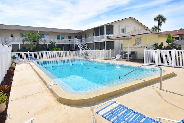 320 Base Ave E Unit 215, Venice, FL 34285 - community pool with a patio
