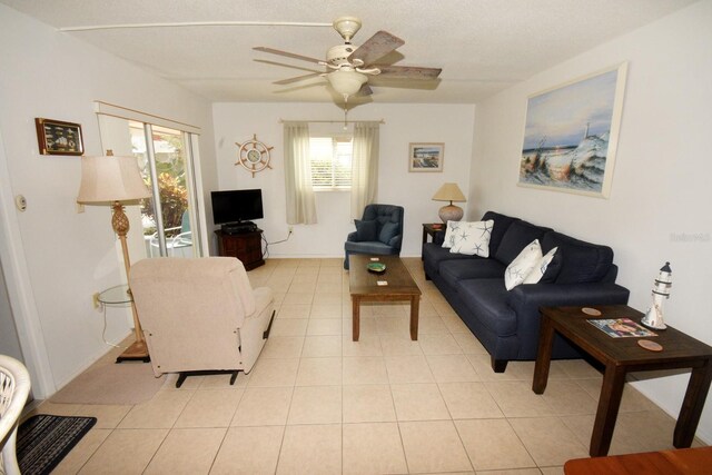 320 Base Ave E Unit 215, Venice, FL 34285 - living area featuring a ceiling fan and light tile patterned floors