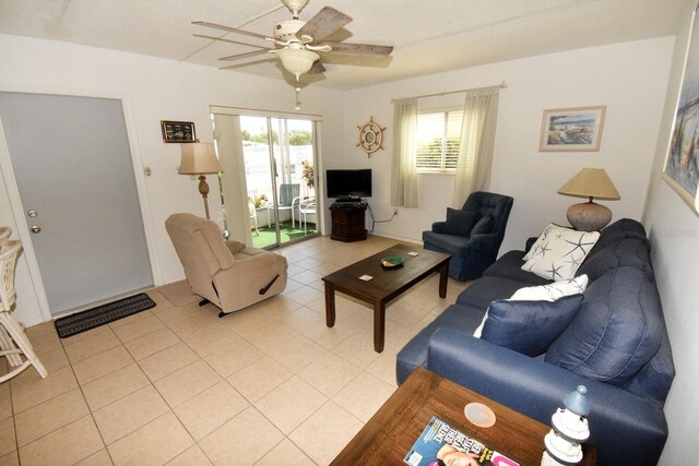 320 Base Ave E Unit 215, Venice, FL 34285 - living room with a ceiling fan and light tile patterned flooring