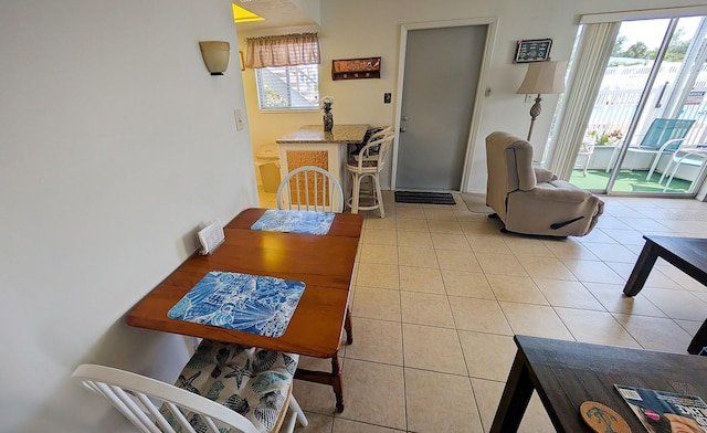 320 Base Ave E Unit 215, Venice, FL 34285 - living area featuring light tile patterned floors