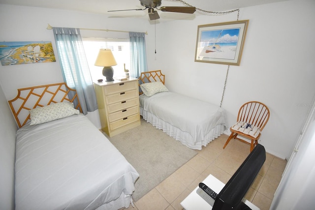 320 Base Ave E Unit 215, Venice, FL 34285 - bedroom featuring a ceiling fan and light tile patterned floors
