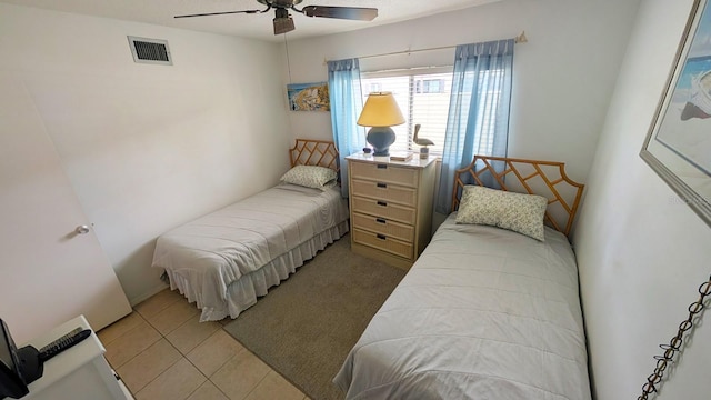 320 Base Ave E Unit 215, Venice, FL 34285 - bedroom featuring light tile patterned floors and ceiling fan
