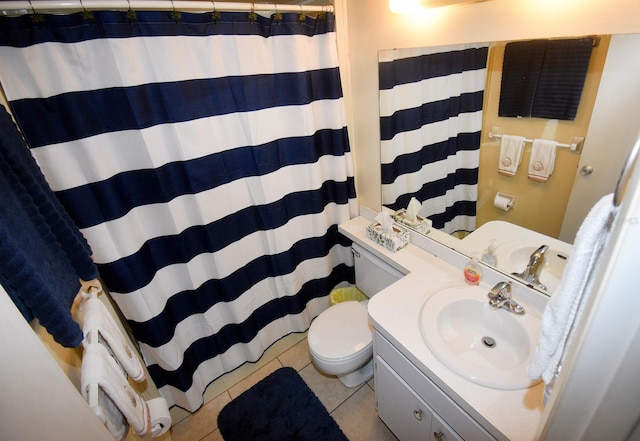 320 Base Ave E Unit 215, Venice, FL 34285 - bathroom with vanity, tile patterned flooring, and a shower with curtain