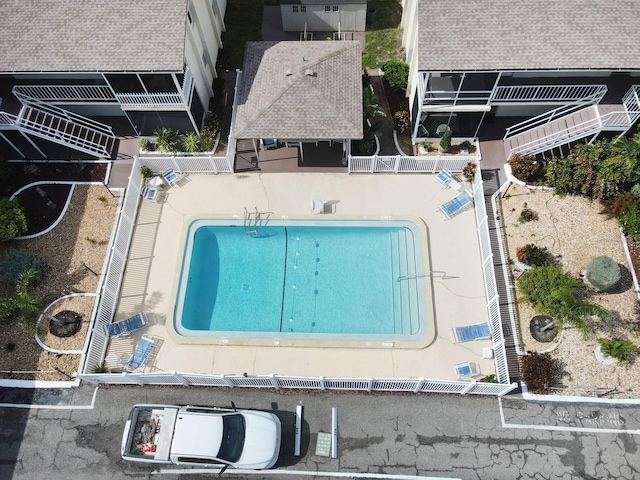 320 Base Ave E Unit 215, Venice, FL 34285 - view from above of property featuring a pool