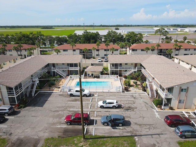 320 Base Ave E Unit 215, Venice, FL 34285 - drone / aerial view of a pool area