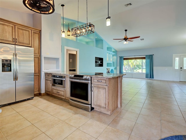23102 Madelyn Ave, Port Charlotte, FL 33954 - kitchen with appliances with stainless steel finishes, light tile patterned floors, open floor plan, light stone counters, and high vaulted ceiling