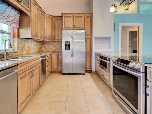 23102 Madelyn Ave, Port Charlotte, FL 33954 - kitchen featuring stainless steel appliances, light stone counters, vaulted ceiling, backsplash, and light tile patterned flooring
