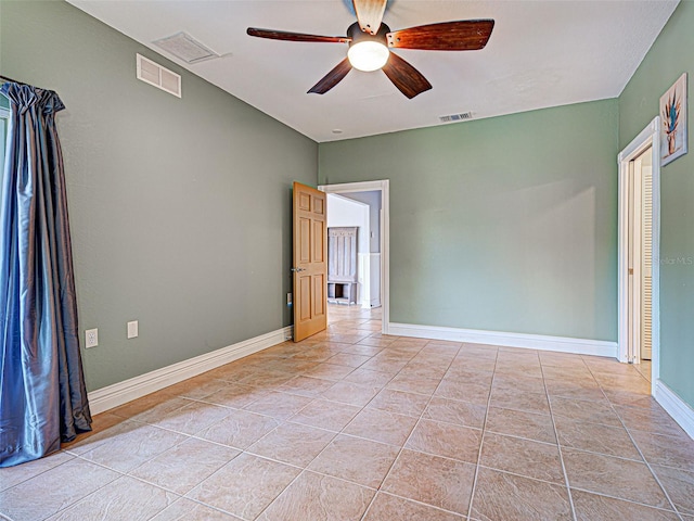 23102 Madelyn Ave, Port Charlotte, FL 33954 - spare room featuring ceiling fan and light tile patterned floors