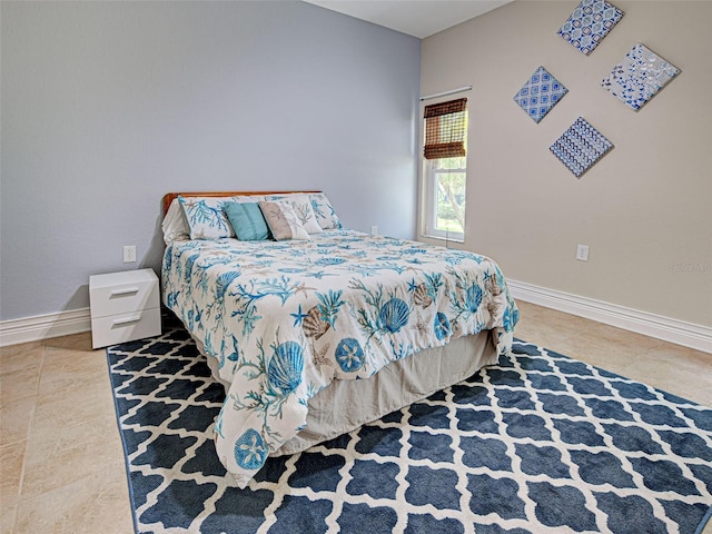 23102 Madelyn Ave, Port Charlotte, FL 33954 - bedroom featuring tile patterned flooring and baseboards