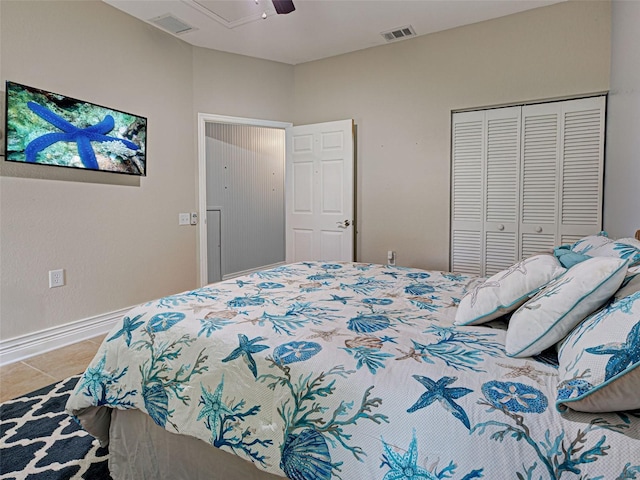 23102 Madelyn Ave, Port Charlotte, FL 33954 - bedroom featuring a closet, tile patterned flooring, and a ceiling fan