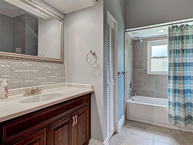 23102 Madelyn Ave, Port Charlotte, FL 33954 - full bath featuring shower / bath combination with curtain, vanity, a closet, decorative backsplash, and tile patterned floors