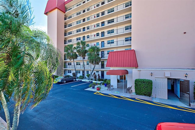 244 Saint Augustine Ave Unit 202, Venice, FL 34285 - view of apartment building / complex with uncovered parking