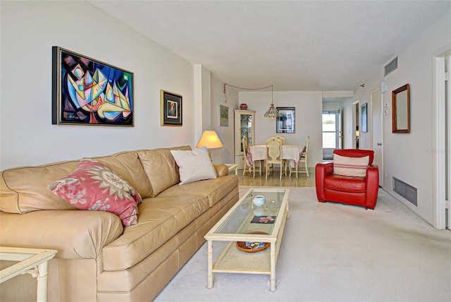 244 Saint Augustine Ave Unit 202, Venice, FL 34285 - living area featuring carpet flooring