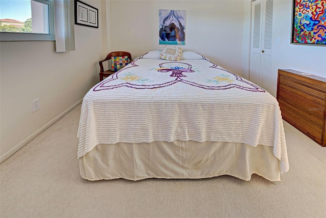 244 Saint Augustine Ave Unit 202, Venice, FL 34285 - carpeted bedroom featuring a closet and baseboards