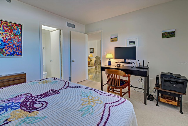 244 Saint Augustine Ave Unit 202, Venice, FL 34285 - carpeted bedroom with a desk and connected bathroom