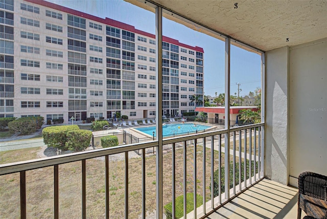 244 Saint Augustine Ave Unit 202, Venice, FL 34285 - balcony featuring view of pool area