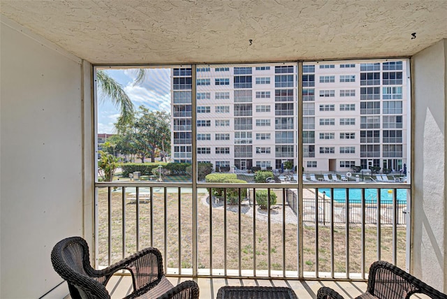 244 Saint Augustine Ave Unit 202, Venice, FL 34285 - balcony featuring view of pool area