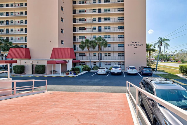 244 Saint Augustine Ave Unit 202, Venice, FL 34285 - view of apartment building / complex with uncovered parking