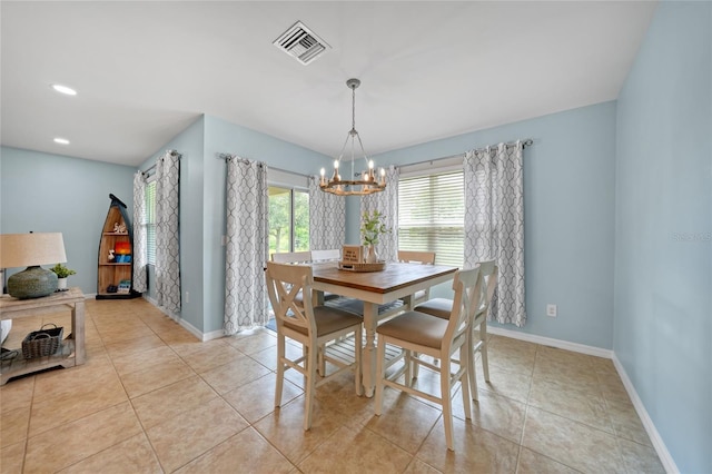 7164 Mikasa Dr, Punta Gorda, FL 33950 - dining space featuring a chandelier, light tile patterned floors, and recessed lighting