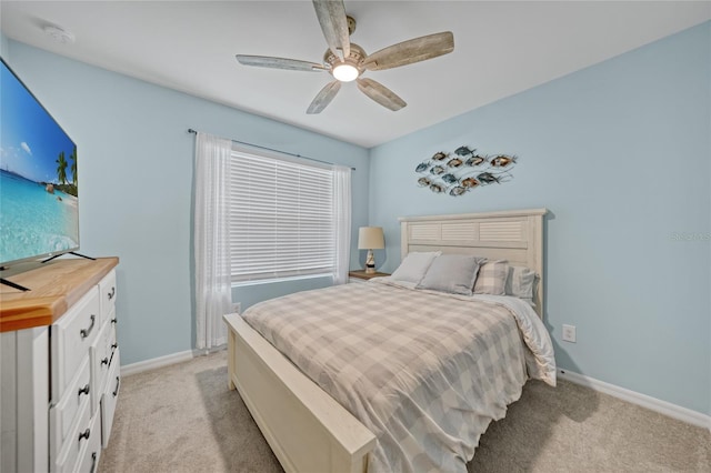 7164 Mikasa Dr, Punta Gorda, FL 33950 - bedroom with light carpet and ceiling fan