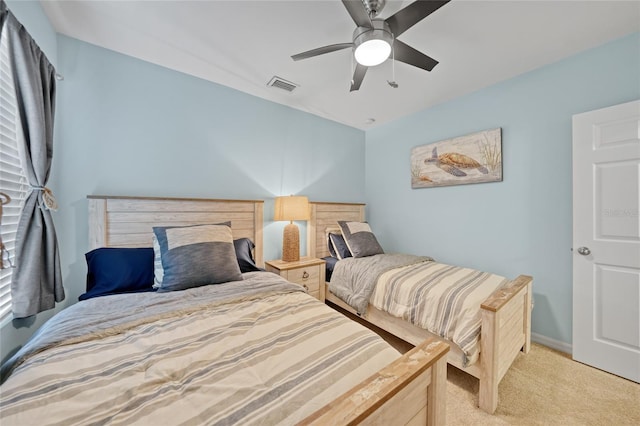 7164 Mikasa Dr, Punta Gorda, FL 33950 - bedroom featuring light colored carpet and ceiling fan